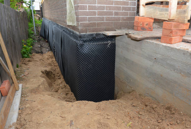 Happy homeowners after waterproofing job in Grosse Pointe